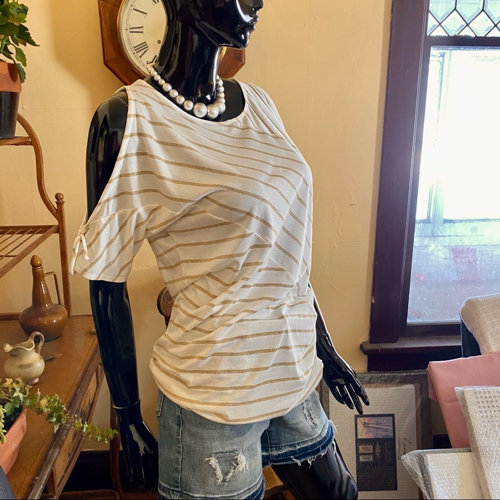 Spanner cold shoulder intriguing top!